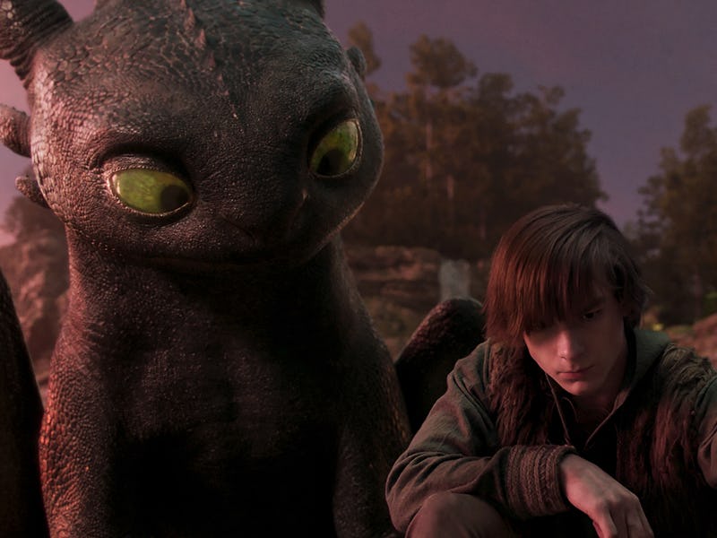 Night Fury dragon, Toothless, and Hiccup (Mason Thames) in How to Train Your Dragon